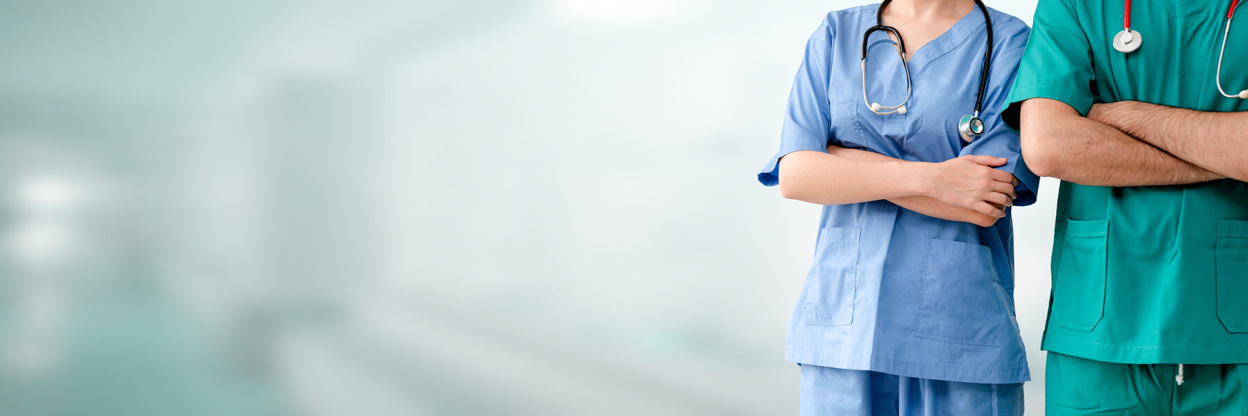 This image shows two healthcare professionals standing side by side, representing the topic of this post - healthcare fundraising.