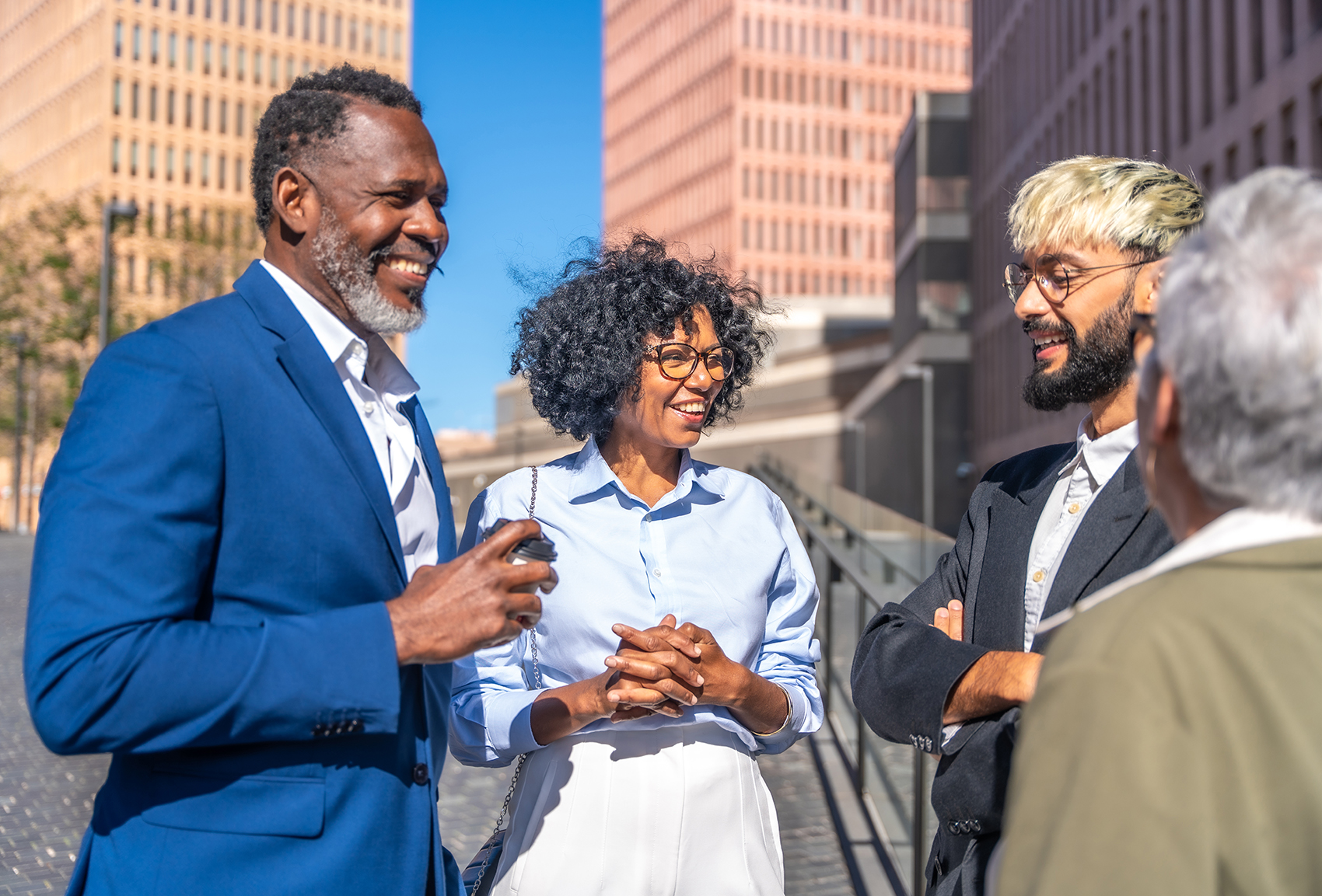 Nonprofit professionals speak with donors to enhance donor engagement